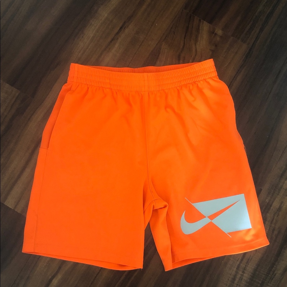 Nike boys Bright Orange Athletic Shorts with Reflective Logo